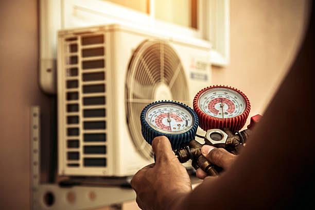 Professional Hvac technician working in Winfield, AL
